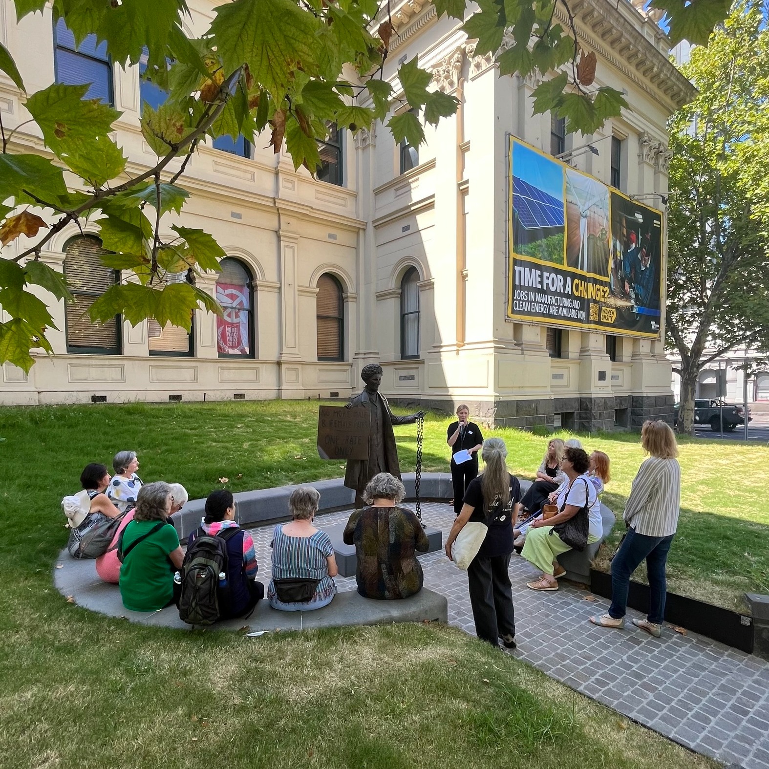 Tour group outside of the Victoria Trades Hall.